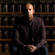 Bryan Stevenson in front of social collection jars, Equal Justice Initiative, 2018